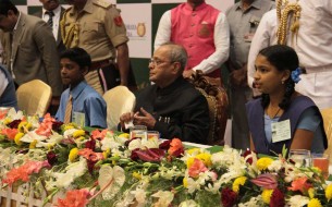 The President of India, Shri Pranab Mukherjee, having dinner with children along with other dignitaries