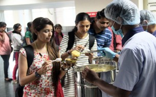 People at Nayandahalli Metro Station get a taste of Akshaya Patra’s delicious food