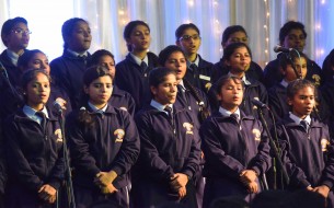 Students of St. Joseph's Convent Girls High School and St. Joseph's Convent PU College singing the invocation song to begin the commemoration event