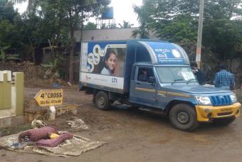 Akshaya Patra delivery van reaches the distribution point with cooked food