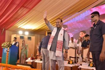 Waving to fans during the inauguration ceremony