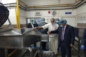 Shri. Dharmendra takes a moment to inspect the equipment