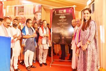 Opening the Ceremonial Plaque with the reveal curtain to mark a historic moment