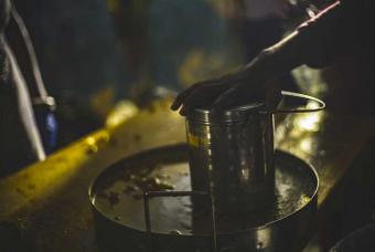 A labourer packs the food for his family.